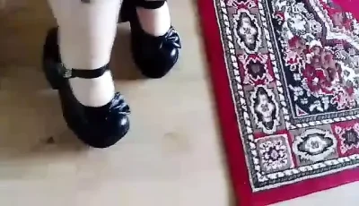 Black gothic heels at home